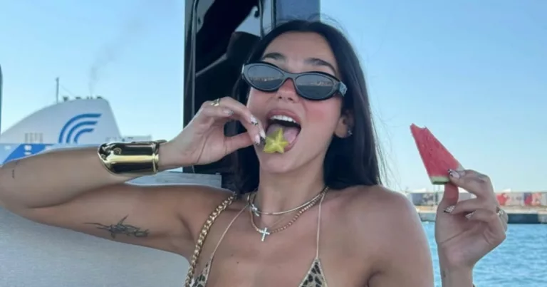 Dua Lipa Stuns in UnderboobBaring Bikini Just Having a Good Time